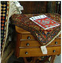 antique table and small area rug
